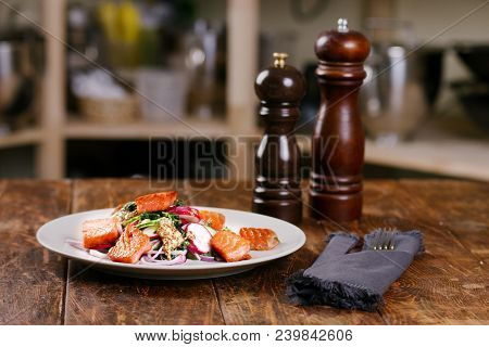 Red Fish Salmon With Radish And Spinach, Served On White Plate On Wooden Table. Rustick Style. View 