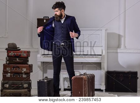 Hotel Service Concept. Man, Traveller With Beard And Mustache With Luggage, Luxury White Interior Ba