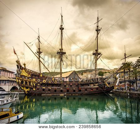 Pirate Sailing Ship Galleon Sailer In The Port Of Genoa Under A Yellow Storm Cloudscape - Liguria - 