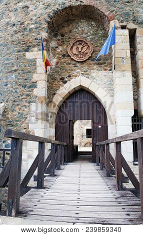 Wooden Bridge Held By Massive Rock Pillars Leads The Way Into The Neamt Citadel Is A Medieval Fortre