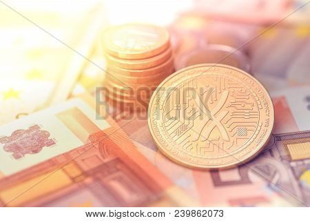 Shiny Golden Airporn Cryptocurrency Coin On Blurry Background With Euro Money Token