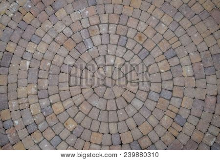 Background Texture Of Paving Slabs In Circles.