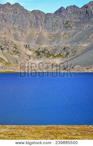 Chugach National Forest Above Anchorage, Alaska.  Landscape
Of Mountains And Creek Running To The Oc