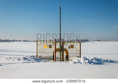 Part Of Gas Main On A Sunny Winter Day