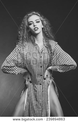 Attractive Radiant Looking Blond Young Woman With Long Wavy Hair Wearing Shirt With Hounds Tooth Pri