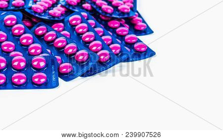 Ibuprofen In Pink Tablet Pills Pack In Blue Blister Pack Isolated On White Background With Copy Spac