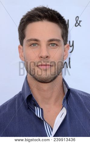 LOS ANGELES - MAY 6:  Dean Geyer at the 11th Annual George Lopez Foundation Celebrity Golf Classic Pre-Party at the Paramount Studios on May 6, 2018 in Los Angeles, CA