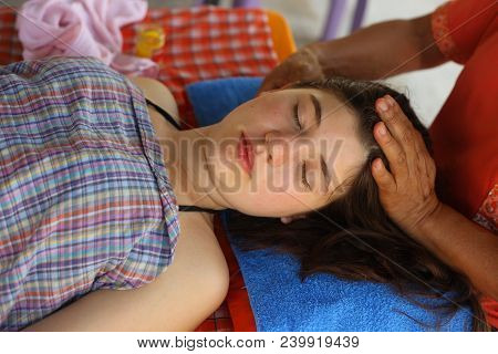 Beautiful Young Teenager Girl Getting An Outdoor Face Massage.