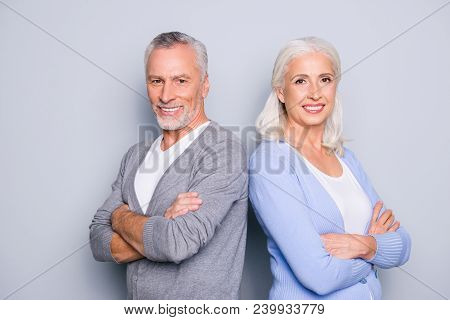 Concept Of Being Good Workers Even When You Are Aged Person. Two Confident Elderly People Standing W