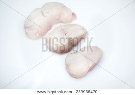 Monkfish Tail Steaks. Isolated Over White Background. Isolated Over White Background