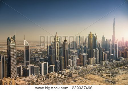 Dubai Skyline From The Air. Dubai Downtown And Modern Skyscrapers.
