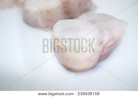Monkfish Tail Steaks. Isolated Over White Background. Isolated Over White Background