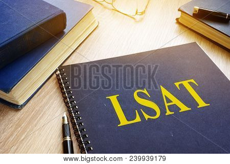 Lsat Study Guide And Pen On A Table.
