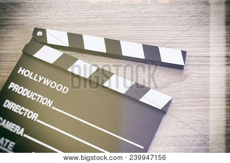 Clapper Board,movie Clapper On Wooden Backgrond