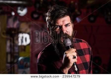 Musician With Beard And Mustache Singing Song In Karaoke. Music And Leisure Concept. Guy Likes To Si