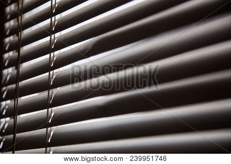 Blinds In A Home Catching The Sunlight,metal Shutter Window Background.blinds. Window Blind. Blind B