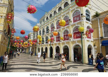 Macau, China - September 11, 2013: Unidentified People Walk By The Senado Square In Macau, China.