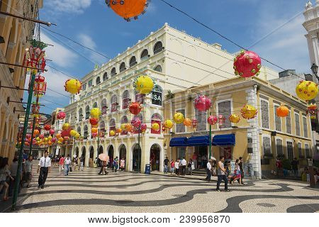 Macau, China - September 11, 2013: Unidentified People Walk By The Senado Square In Macau, China.