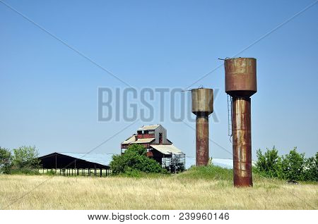 Two Large Steel Water Tanks In The Village