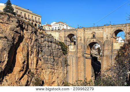 Cliffs And Puente Nuevo Bridge In Ronda, One Of The Famous Villages In Andalusia, Spain