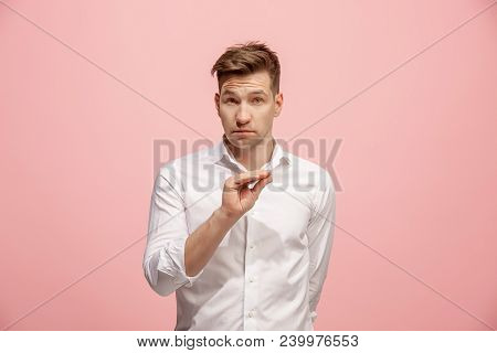Secret, Gossip Concept. Young Man Whispering A Secret Behind His Hand. Businessman Isolated On Trend
