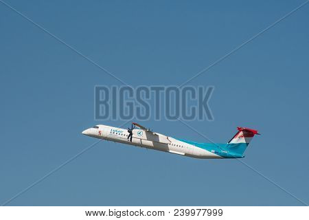 Berlin Germany - April 21. 2018: Bombardier Dash 8 Q400 From Luxair Take Off At Berlin Tegel Airport