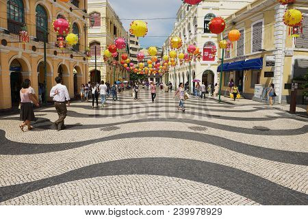 Macau, China - September 11, 2013: Unidentified People Walk By The Senado Square In Macau, China.