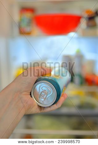 Man Taking Beer Can From Fridge, Close Up