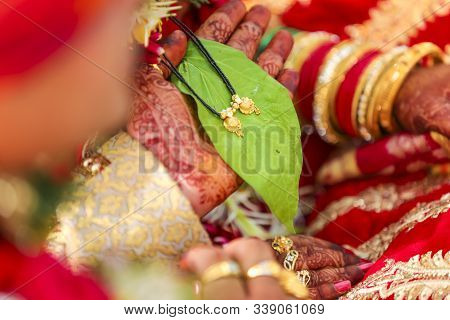 Indian Wedding Ceremony : Mangasutra  Holding In Groom Hand