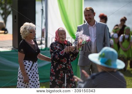NIKOLSKIY / LENINGRAD REG, RUSSIA - JUN 16, 2018: During festival events dedicated to 69th anniversary of urban-type settlement Nikolskiy formation on the river Svir connecting Onega and Ladoga lakes.