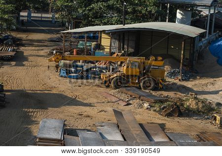 Automobile Crane With Risen Telescopic Boom Outdoors. Mobile Construction Crane On A Constructin Sit