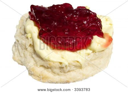 Jordgubbssylt och Clotted Cream på en Scone.