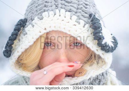 Portrait Of Young Woman Having Flu And Blowing Her Nose. Young Woman With Nose Wiper Near Winter Tre