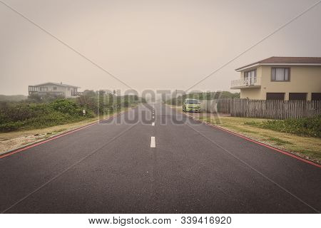 Road In Sedgefiled Town On A Foggy Morning, South Africa