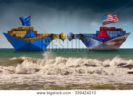 Usa And Eu Trade War Concept. Two Cargo Container Ships With Battering Ram And The European Union An