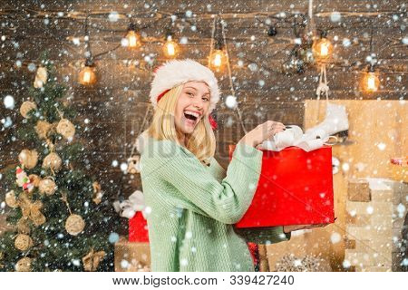 Surprised Woman With Christmas Gift. New Year Presents In Gift Box. Happy Girl Preparing To Celebrat