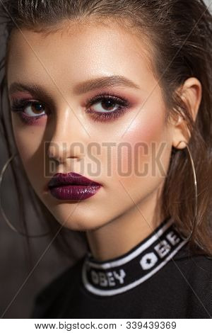 Fashion Portrait Of A Beautiful Girl With Professional Makeup, Lilac Eyeshadows, Rich Lashes, Marsal