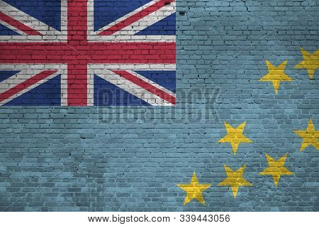 Tuvalu Flag Depicted In Paint Colors On Old Brick Wall. Textured Banner On Big Brick Wall Masonry Ba