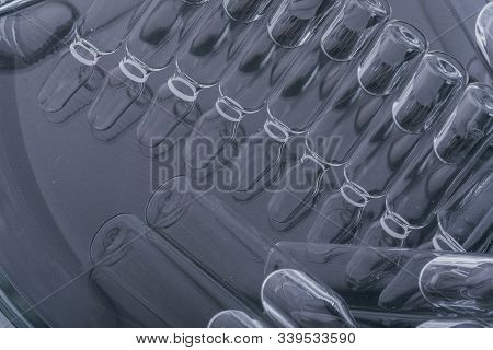 Glass Medical Ampoule Vial For Injection. Medicine Is Liquid Sodium Chloride With Of Aqueous Solutio