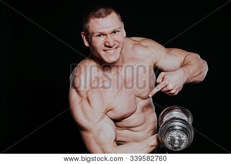 Sport The Athlete Bodybuilder Build Muscles Dumbbells