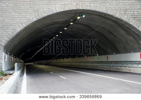 Tunnel For Vehicular Transport. Horizontal Passageway Under An Obstruction