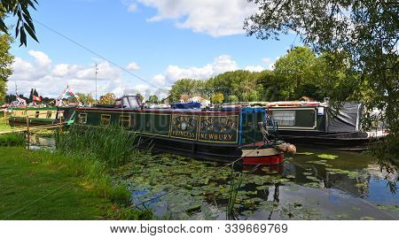 St Neots, Cambridgeshire, England - August 25, 2018: Narrow  Boats On The River Ouse At St Neots.
