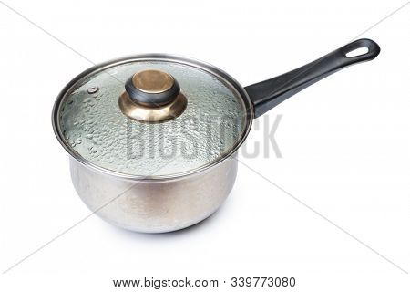 Old stewpan with condensed lid isolated on white background