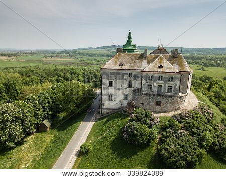 Olesko, Ukraine - May 05 2018: Aerial View Frome Drone To The Historic Castle And Park In Olesko, Lv
