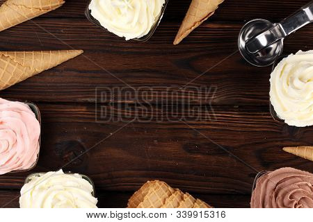 Soft Ice Cream In Flavor Vanilla, Chocolate And Strawberry. Delicous Creamy Refreshing Ice Cream