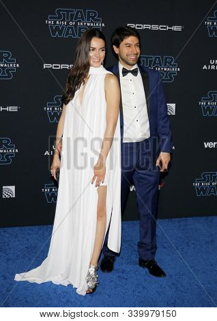 Julieth Restrepo and Sebastian Zuleta at the World premiere of Disney's 'Star Wars: The Rise Of Skywalker' held at the Dolby Theatre in Hollywood, USA on December 16, 2019.