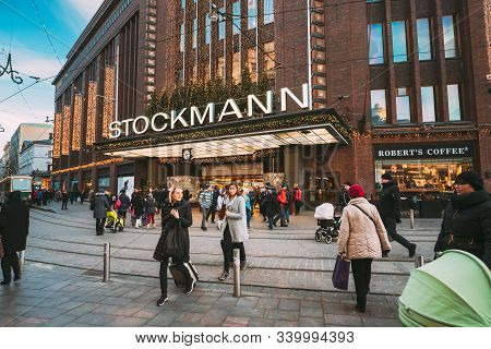 Helsinki, Finland - December 10, 2016: People Walking Near Stockmann Department Store On Aleksanteri