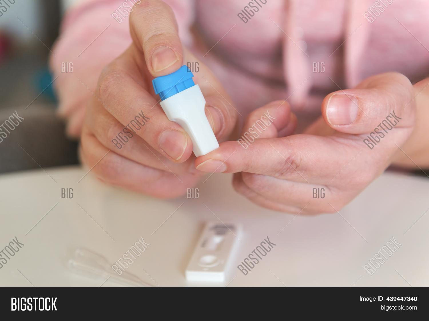 Woman Uses Lancing Image & Photo (Free Trial) Bigstock