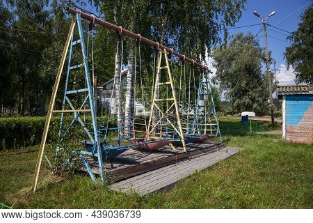 Sortavala, Russia - July 11, 2021: Children's Swing In A City Park In The City Of Sortavala In The R