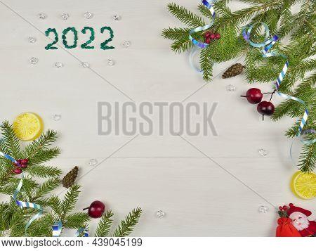 Christmas Background. Branches Of A Christmas Tree And Christmas Tree Toys On A White Background. Ne